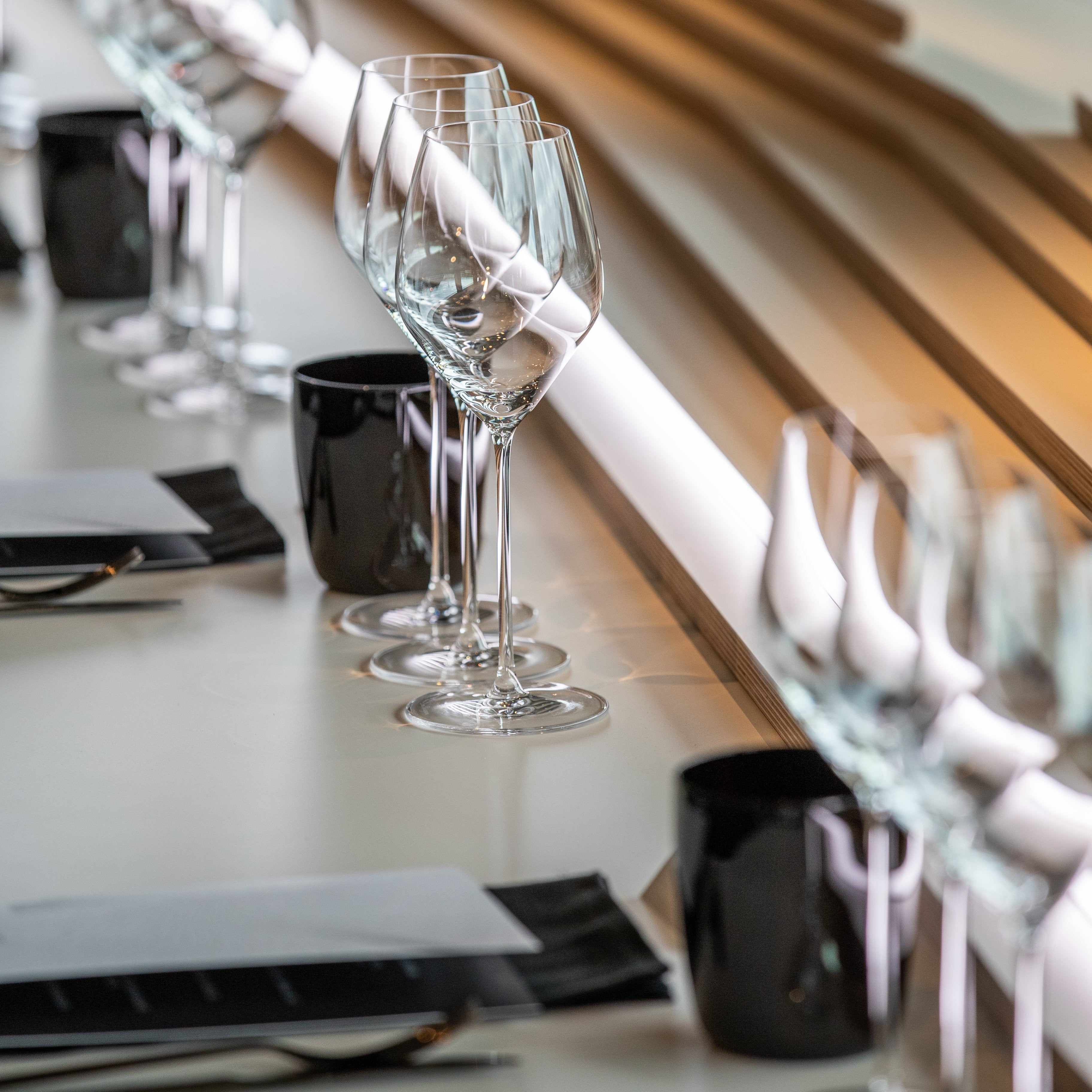 Rent: Black by night water glass