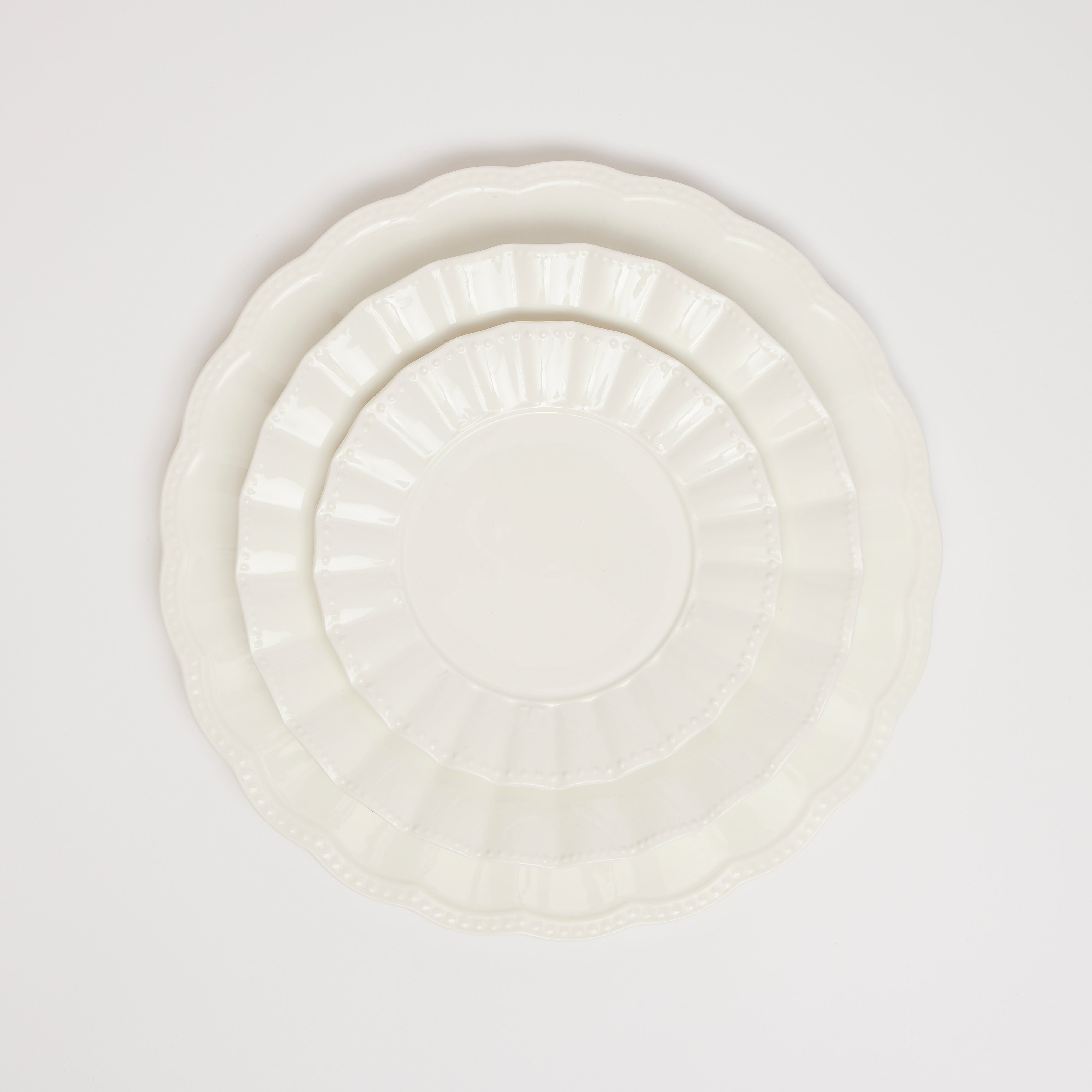 Rent: White Scallop Charger